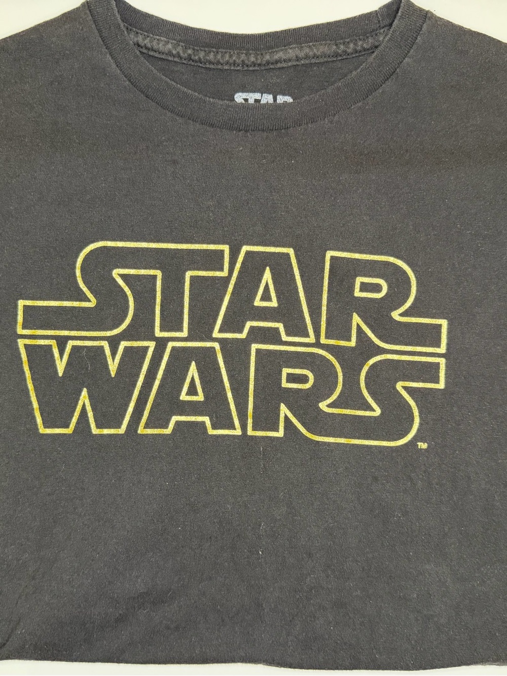 Star Wars Black T-Shirt with Yellow Logo